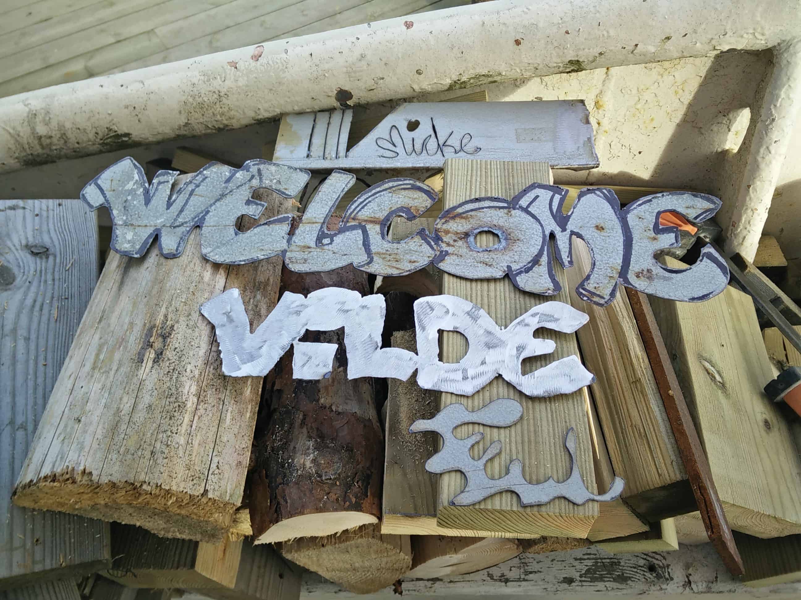 Welcome and Vilde signs made with the plasma cutter