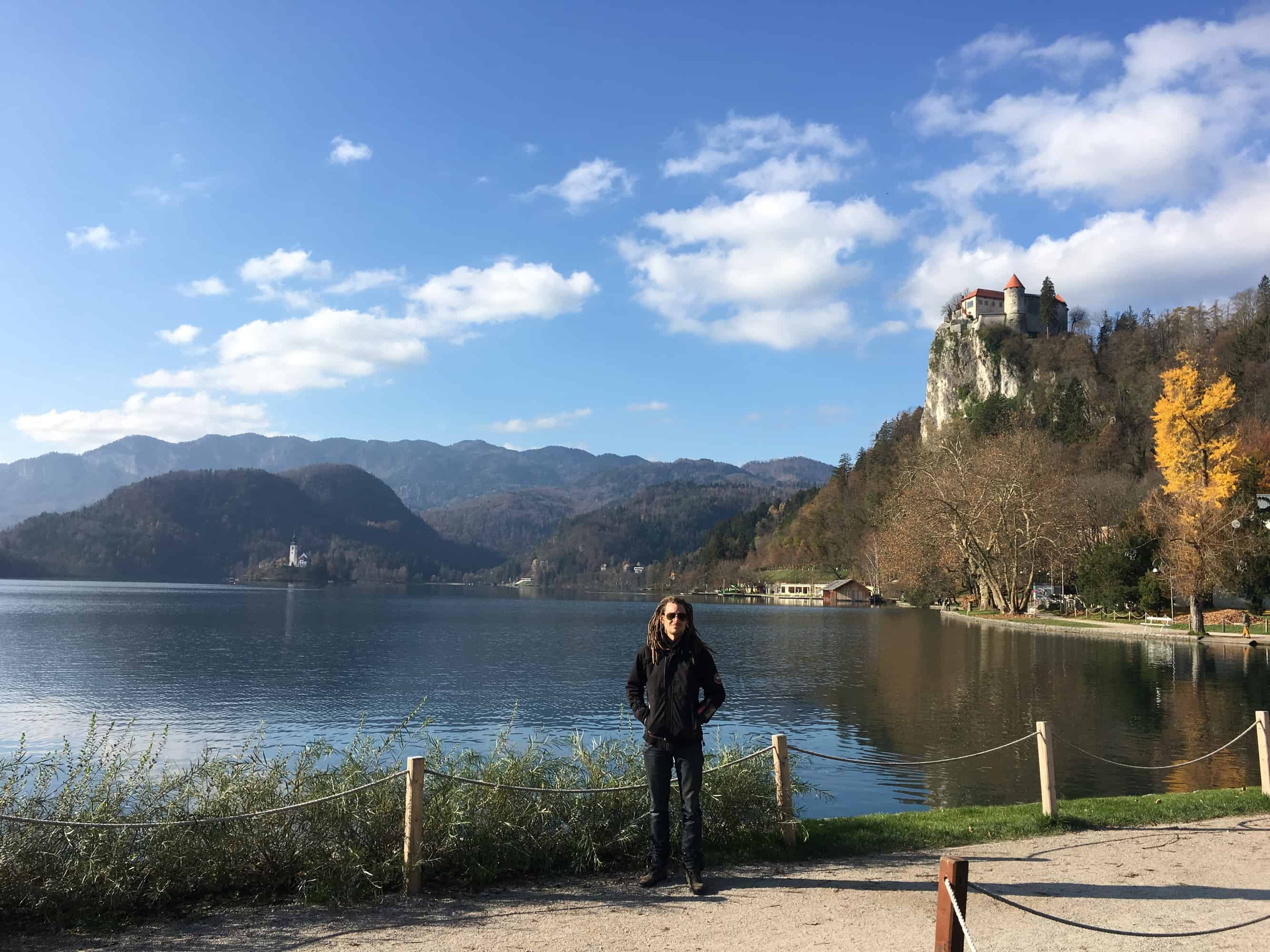 Mike in front of lake Bled and the castle on the top