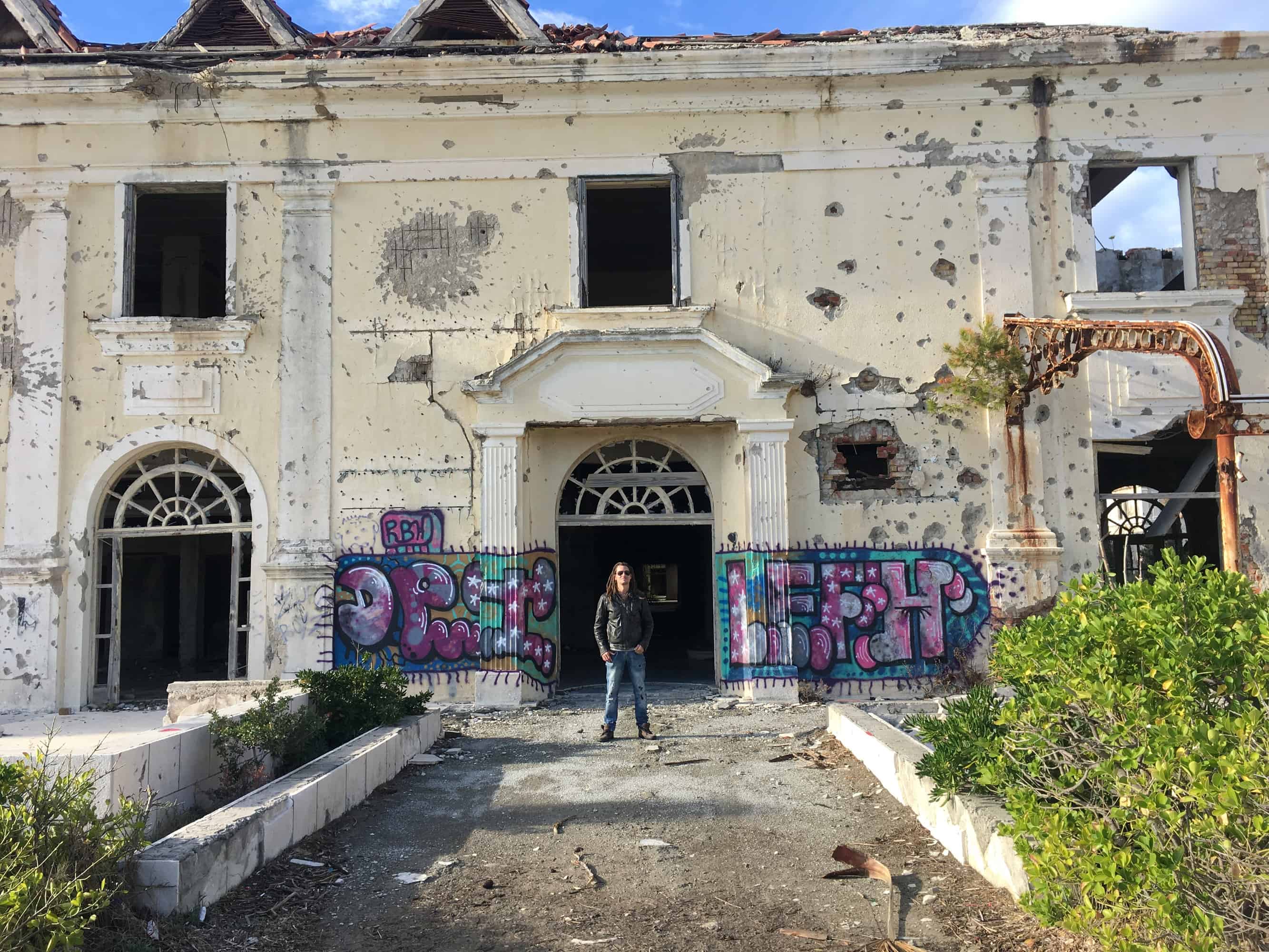 Mike outside one of the abandoned hotels