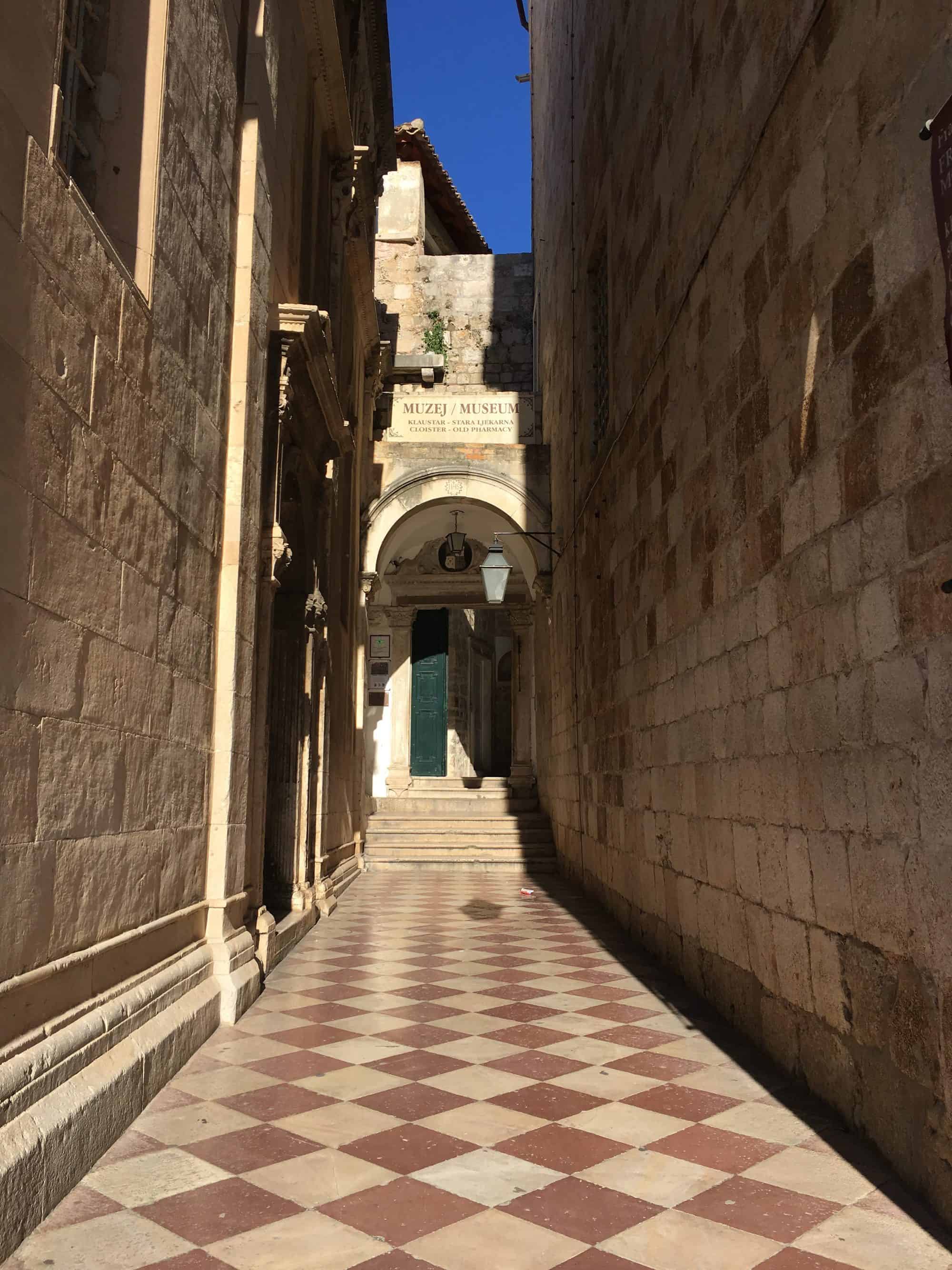 Narrow alley to an old  pharmacy