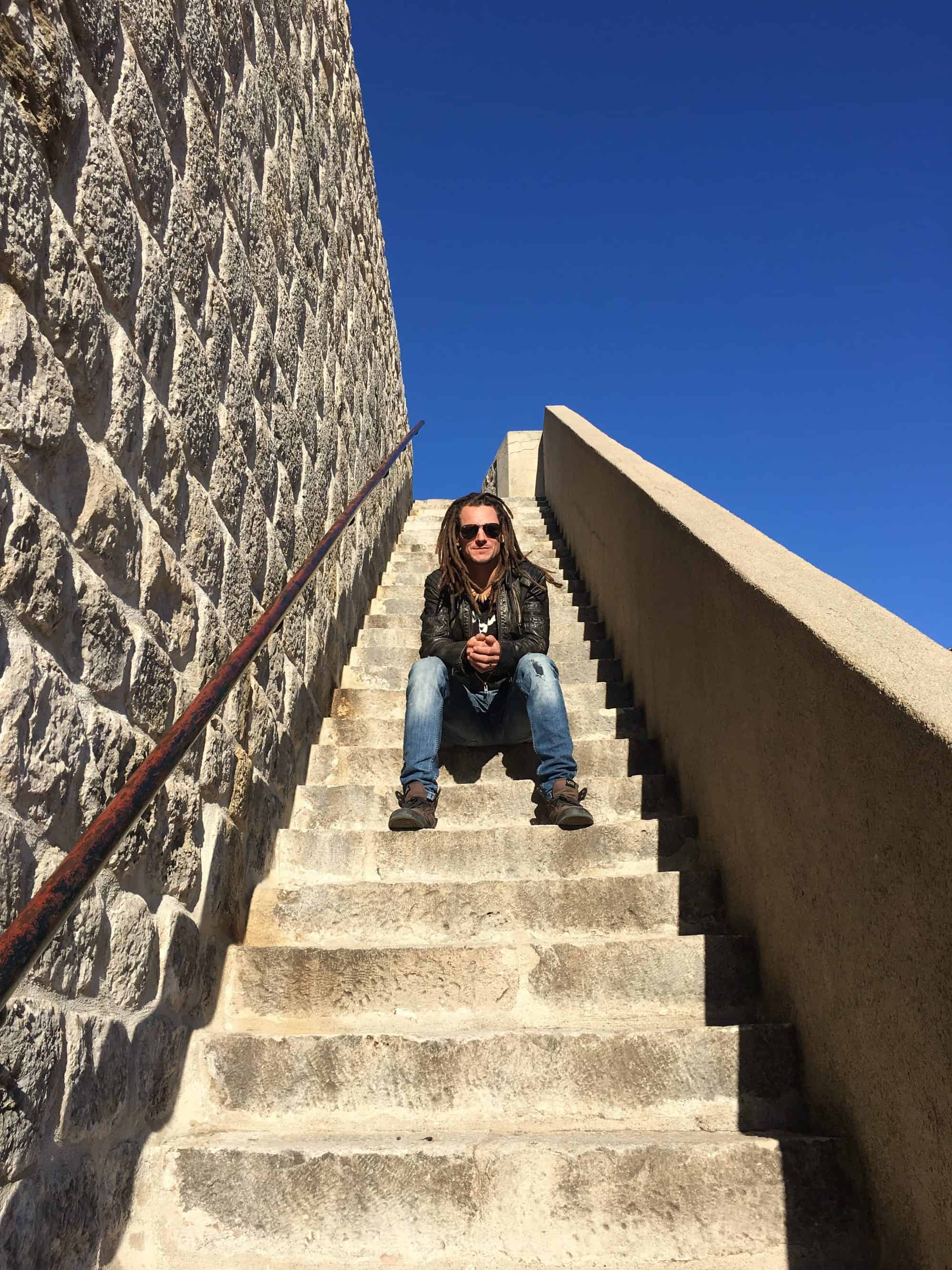 Mike on the stairs leading up to the city wall