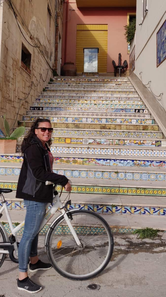 Me in front of some colourful stairs