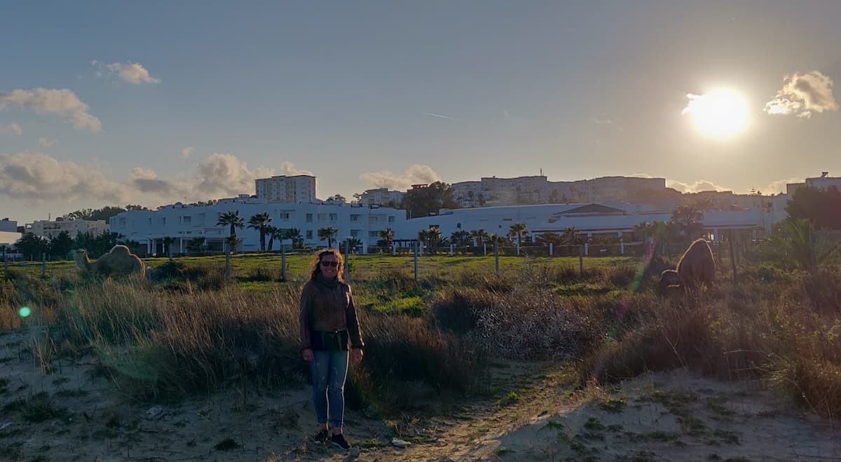 Me and two dromedars at the beach in the sunset