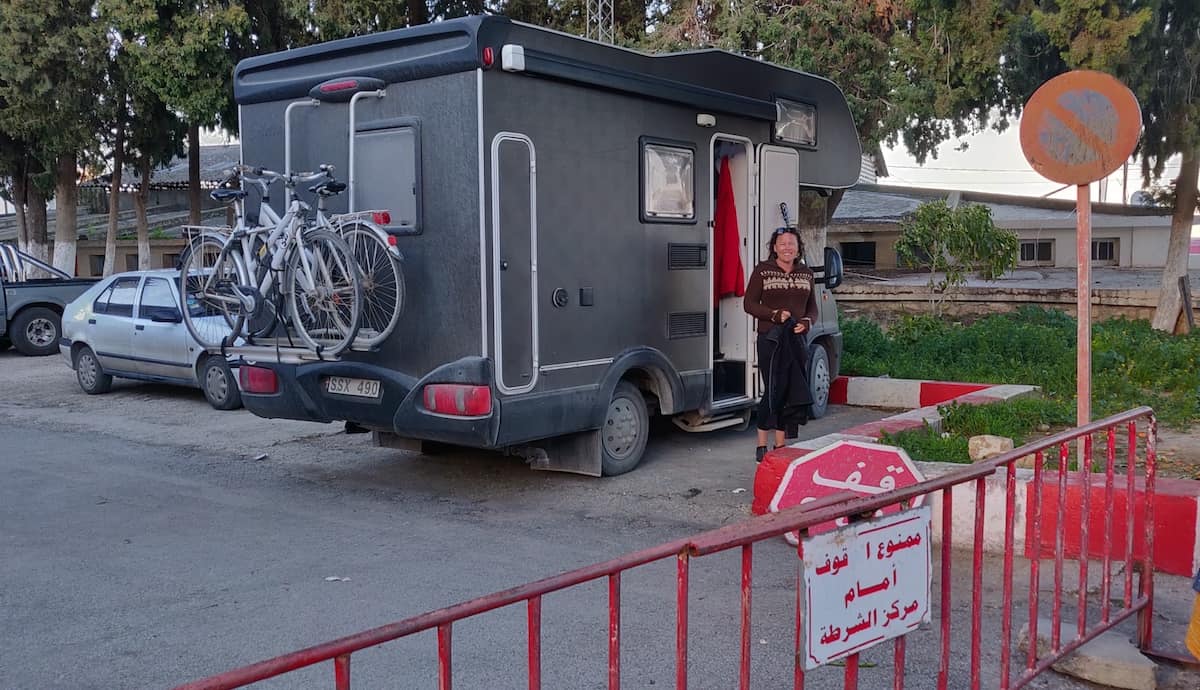 Parked outside the police station