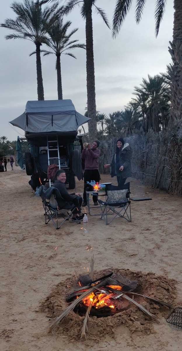 Preparing the food and the fire