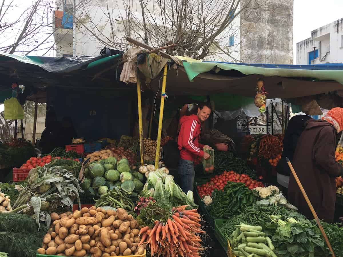 Mike at the vegetable market