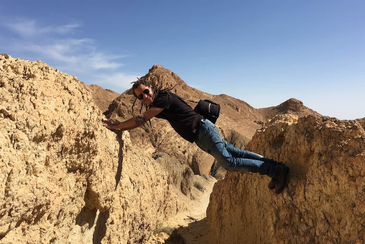 Mike is climbing the rocks