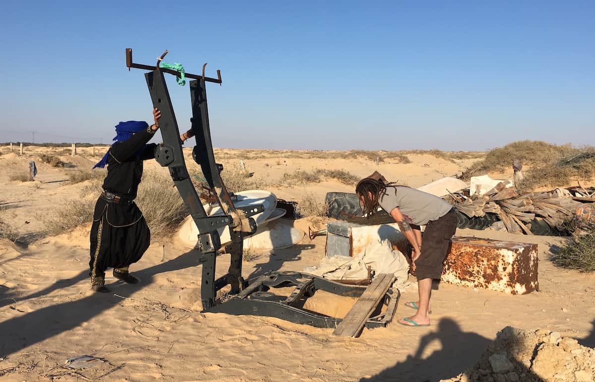 Ahmad is preparing to take up the water from the well