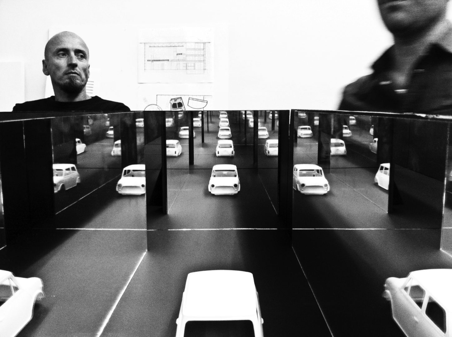 Image in black and white of the Volkswagen exhibition in miniature form by LOOP Associates