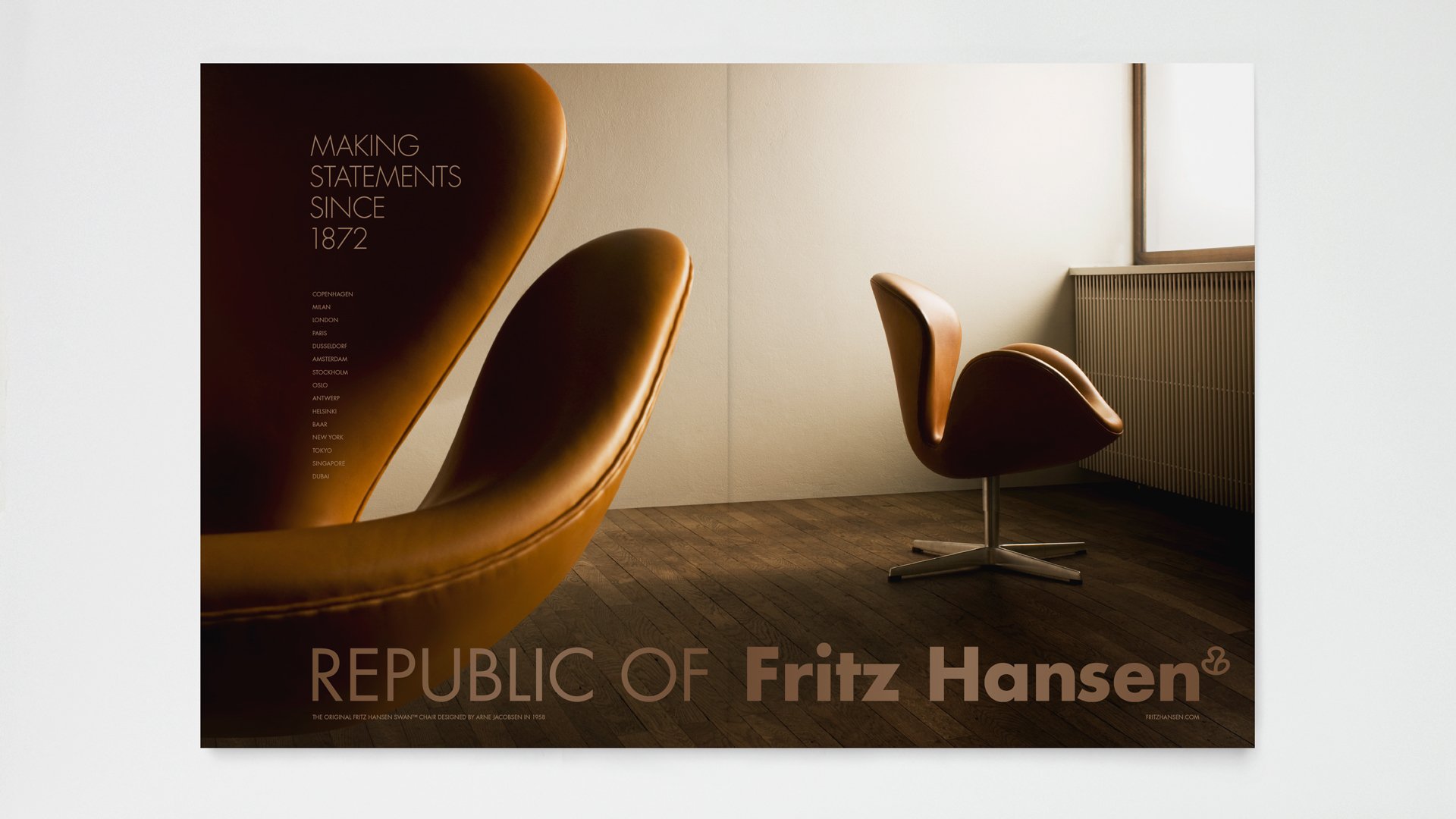 Image of the swan chair with Fritz Hansen logo. Made by LOOP Associates