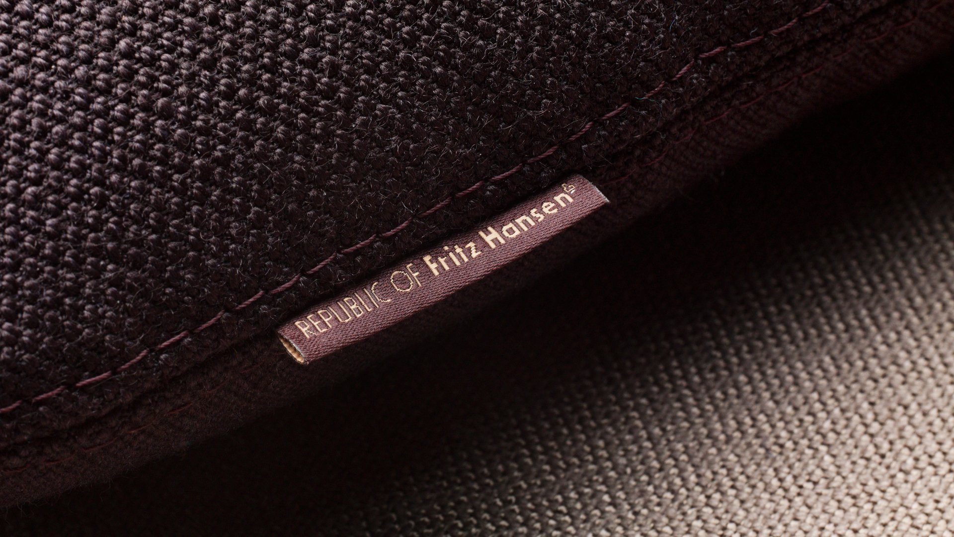 Fritz Hansen label with logo on furniture by LOOP Associates