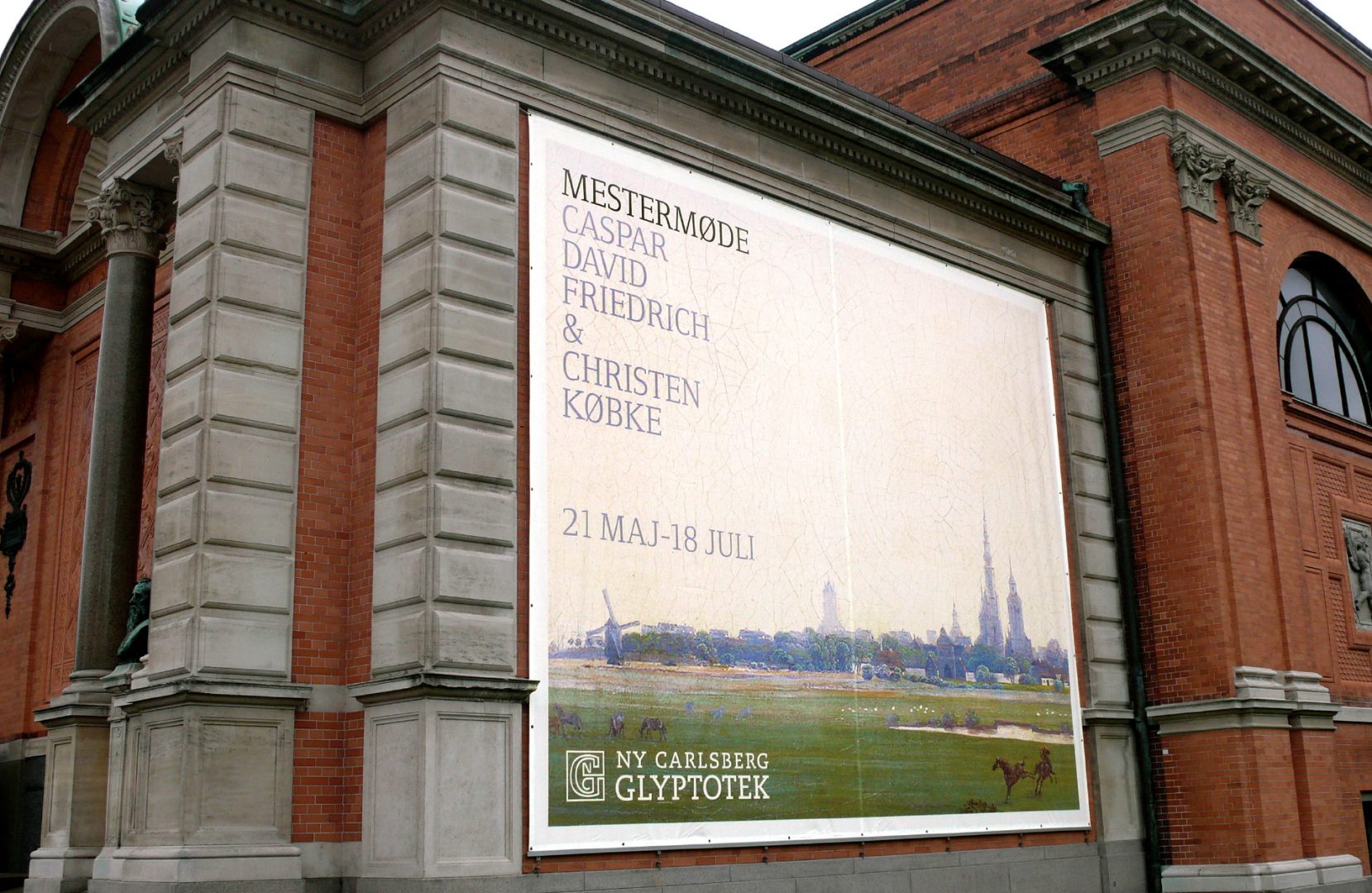 Mockup of campaign with Ny Carlsberg Glyptotek logo on Glyptoteket's building by LOOP Associates