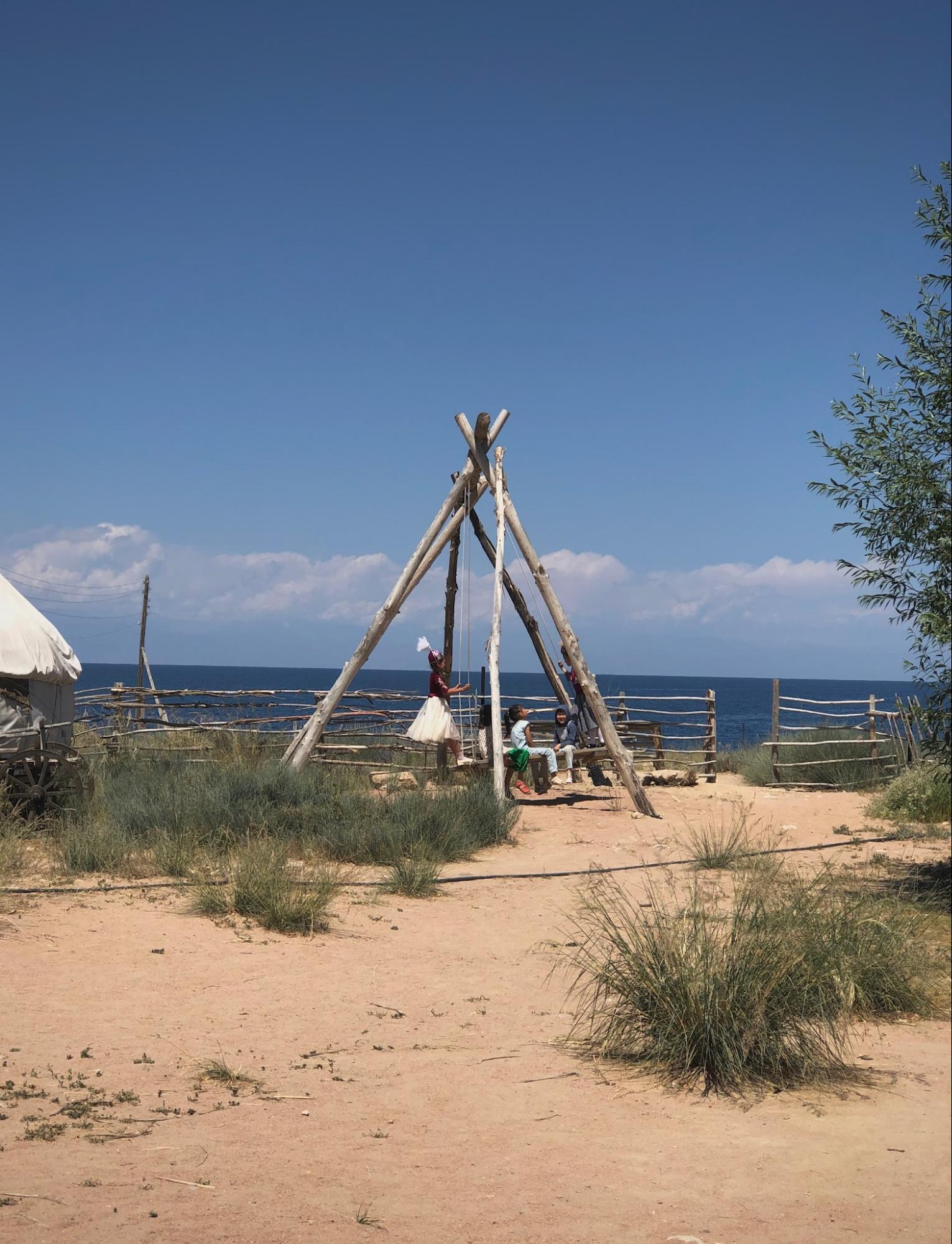 Children playing at a yurt camp