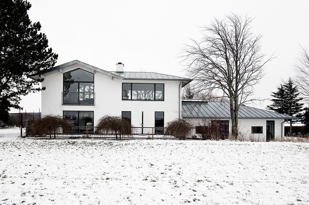 Ombygning af 1970'er klods, den midterste del af bygningen, som tidligere var en vindomsust tagterrasse der sjældent blev anvendt - er nu lavet om til kontor.