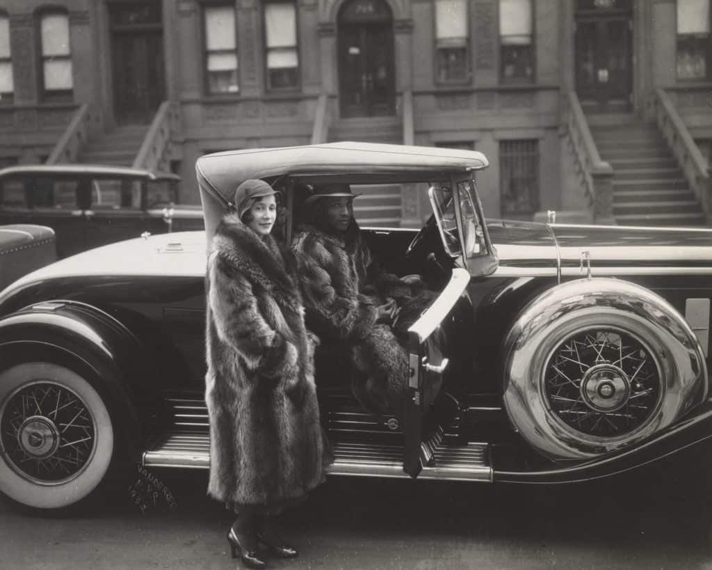 James Van der Zee, Racoon Couple in Car, 1932.