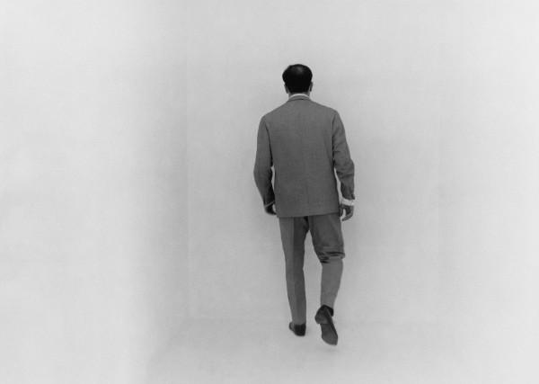 Yves Klein in the white void room. The White Cube.