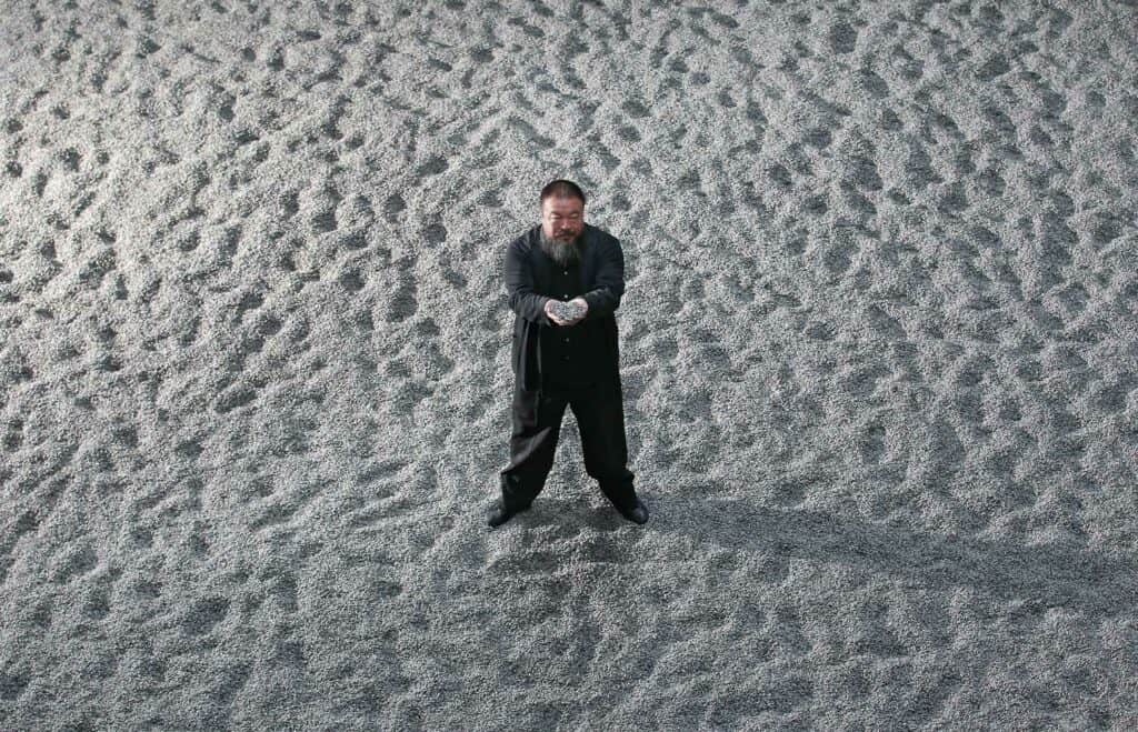 Ai Weiwei and his sunflower seeds in the Turbine Hall of the Tate Modern, via NY Times