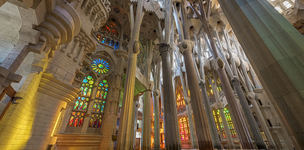 Antoni Gaudí’s Sagrada Família is the most towering example of Modernisme in the world. Note its organic forms, ornamentation, and use of geometric domes and columns.