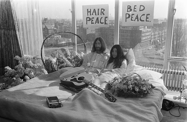 John Lennon and Yoko Ono at the first day of their Amsterdam bed-in