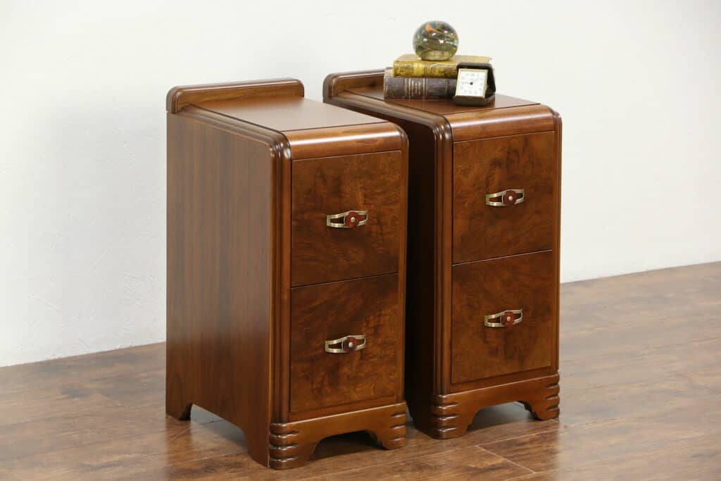 A pair of late 1930s Art Deco waterfall design walnut and matched burl nightstands.