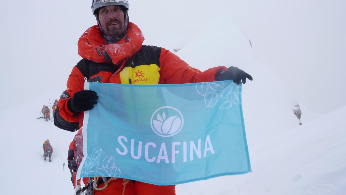 The Sucafina flag just below the summit