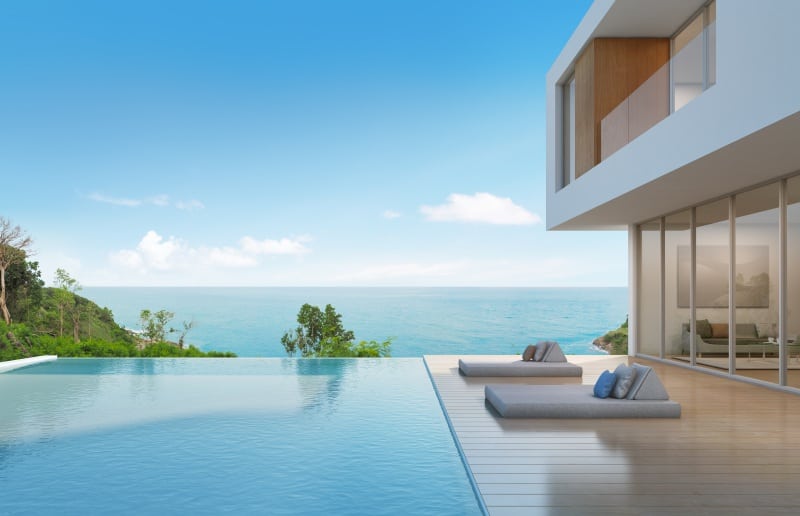 Beach house with pool in modern design - 3d rendering