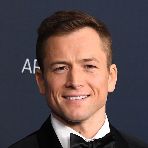 taron-egerton-medium-length-hairstyle-with-widows-peak-hairstyle-haircut-man-for-himself-ft.jpg