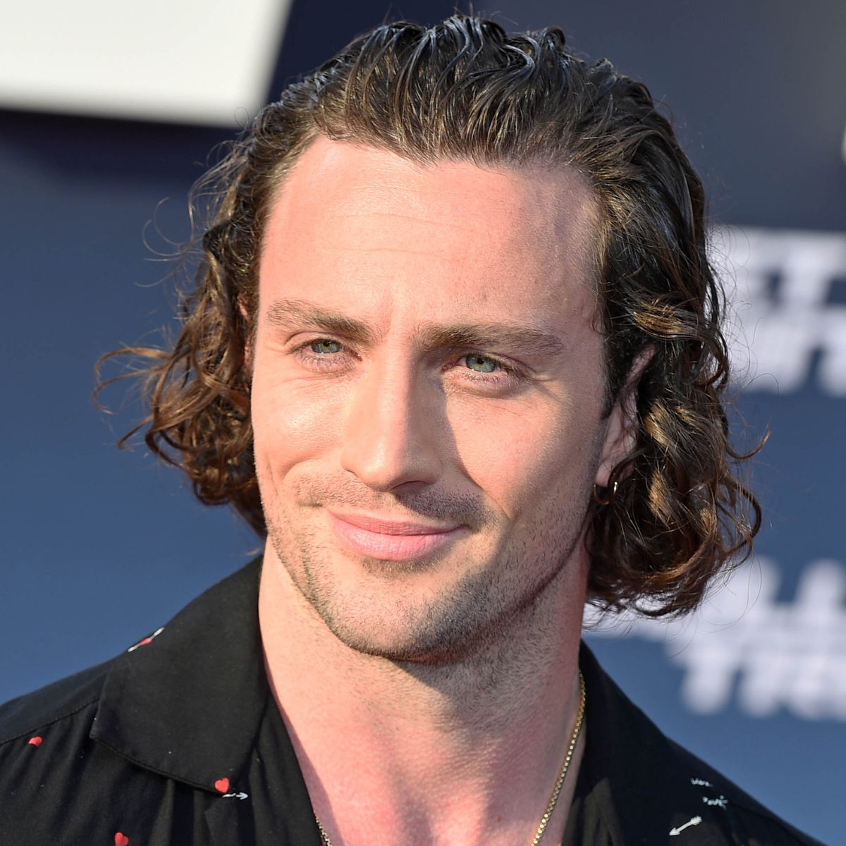 aaron-taylor-johnson-long-curly-swept-back-hairstyle-hairstyle-haircut-man-for-himself-ft.jpg