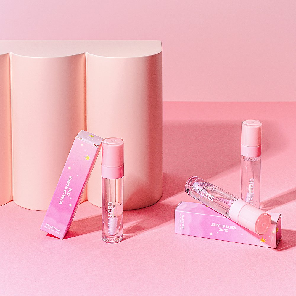 Beauty stills content creation for Subtle CBD lipgloss in pink tones. Styled makeup and cosmetics product stills photography by Marianne Taylor.