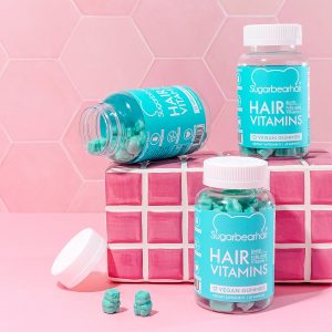 Beauty stills content creation for SugarBearHair hair and sleep vitamins in pastel tones. Styled health product stills photography by Marianne Taylor.