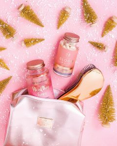 Pink stills Christmas content creation for Bloom Hair vitamins. Styled health product stills photography by Marianne Taylor.