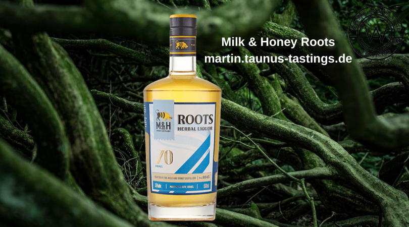 Eine Flasche Milk & Honey Roots mit Wurzeln im Hintergrund