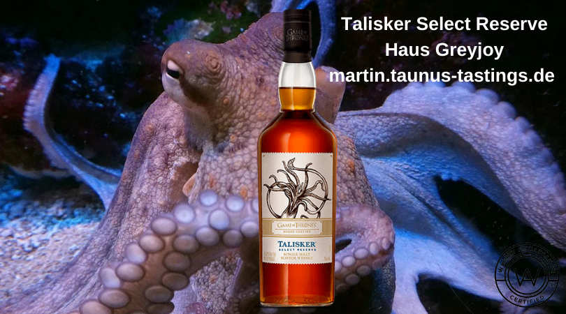 Eine Flasche Talisker Select Reserve Haus Greyjoy, im Hintergrund ein Kraken