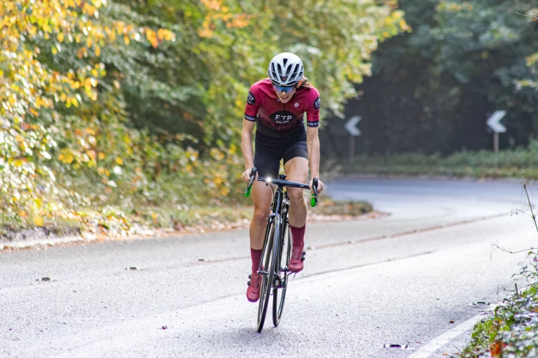 FTP Racing - Women's team member riding up hill