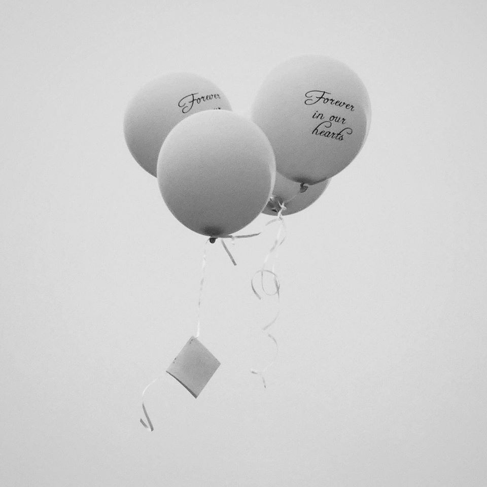 Balloons with message tied to the string