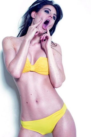 Model in yellow bikini