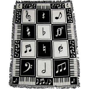 Sprei, pianotoetsen en noten