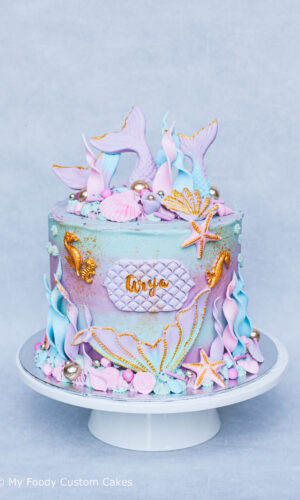 deluxe mermaid taart met eetbare mermaid tails, schelpen, koraal, zeesterren en zeepaardjes