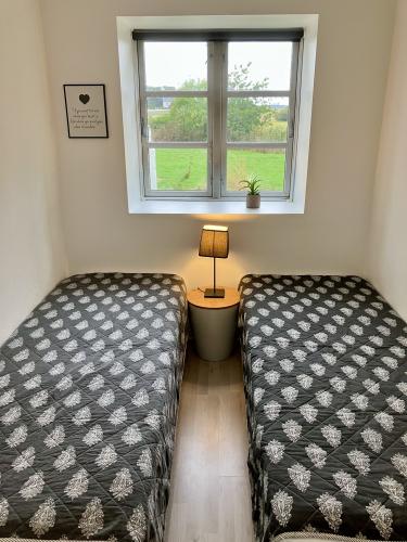 Second bedroom with two single beds (which can be made into a double bed on request)