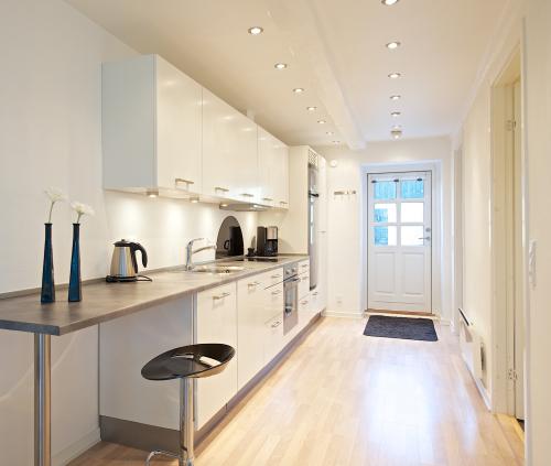 Kitchen with front door in background