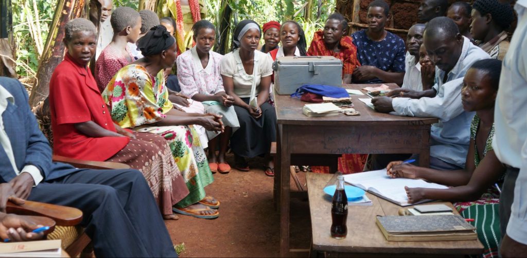 A group of people taking part in the inclusive microfinance programme.