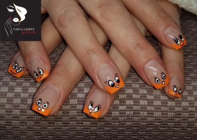 Ausgefallene Nägel, orange mit Smileys von Nail Art Delang