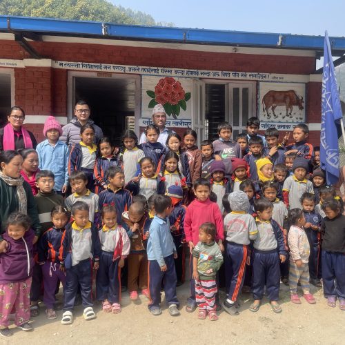 Group photo at Arkul Basic School during Margeratha visit