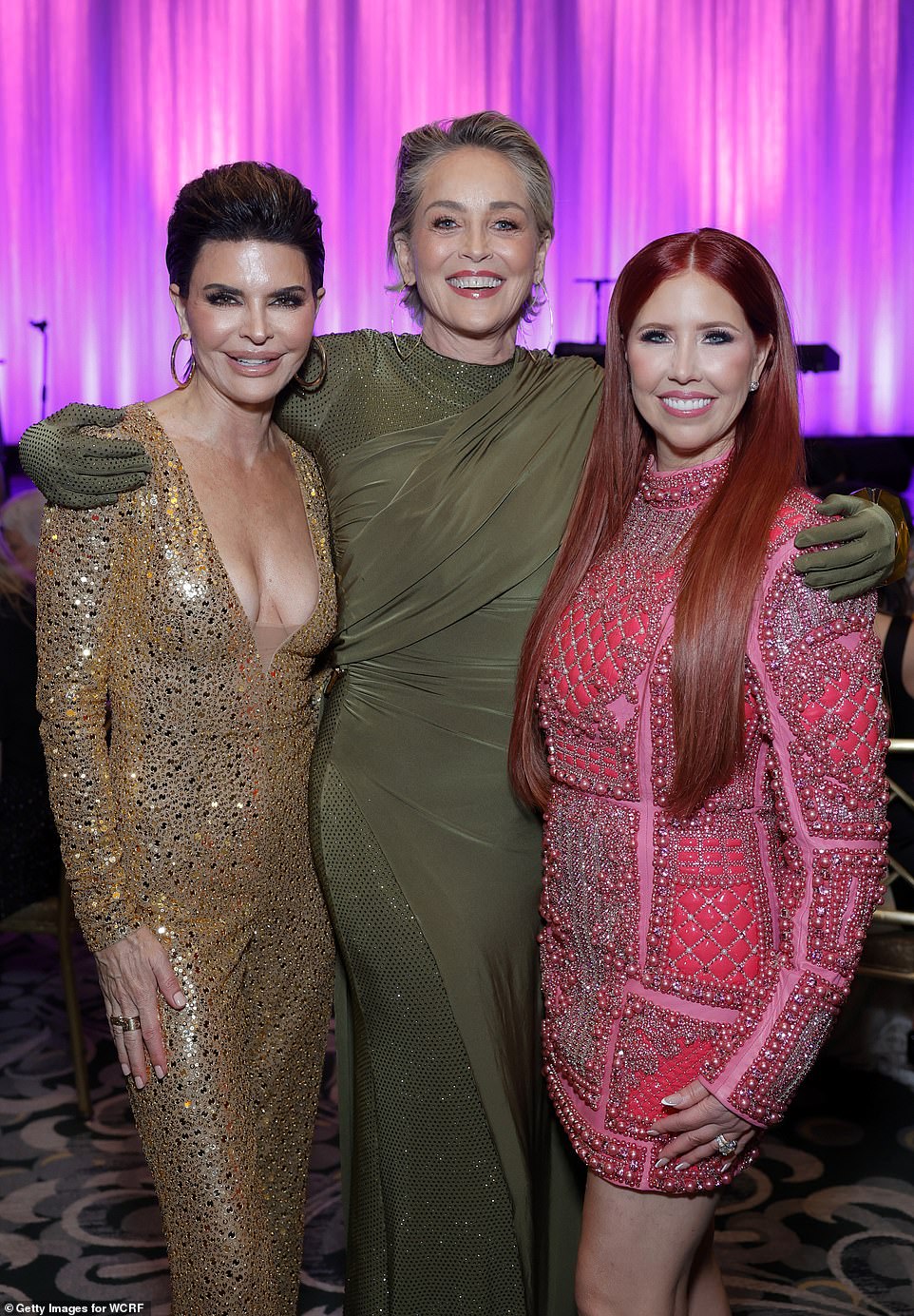 Three's company: Lisa, Sharon and Dr. Stacie J. Stephenson looked in high spirits as they posed for snaps together