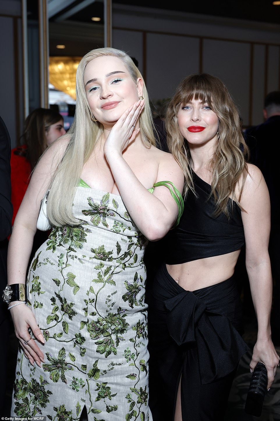Looking good: Kim also posed for snaps with Julianne inside the bash