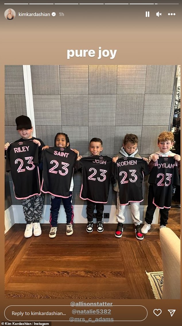 'Pure joy': Kim told her followers: 'Just got back to the room and Oh my god Victoria and David Beckham sent over jerseys', before uploading a snap of Saint grinning as he held up