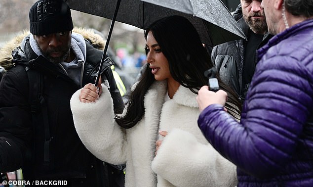 Football fever: The reality star has her hands full as she has taken Saint and his friends on a trip of a lifetime