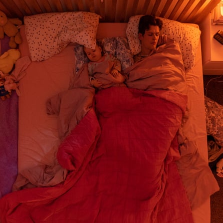 Brad in bed with his 18-month-old daughter Brooke (time 23.14)