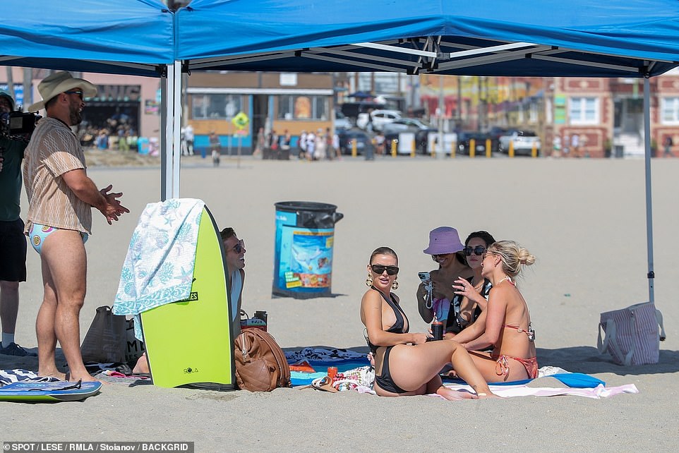 Catching up: The cast could be seen mingling as cameras rolled