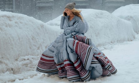 Carrie wearing an impractical Moncler coat.